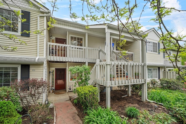 23 Magnolia Ln, Warwick, NY 10990 - view of front facade featuring stairway and a porch