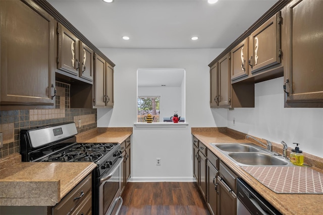 23 Magnolia Ln, Warwick, NY 10990 - kitchen with stainless steel range with gas cooktop, dark wood finished floors, a sink, decorative backsplash, and recessed lighting