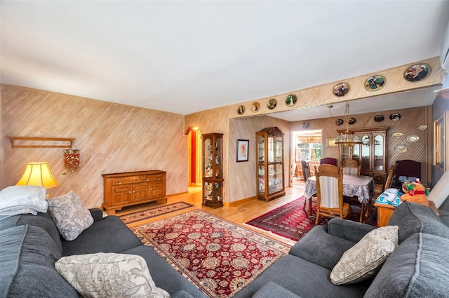 9 Forest Rd, Kings Park, NY 11754 - living area featuring wooden walls and wood finished floors