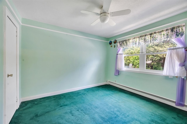 9 Forest Rd, Kings Park, NY 11754 - carpeted spare room featuring a baseboard radiator, ceiling fan, and baseboards
