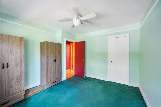 9 Forest Rd, Kings Park, NY 11754 - unfurnished bedroom featuring baseboards, a ceiling fan, and carpet