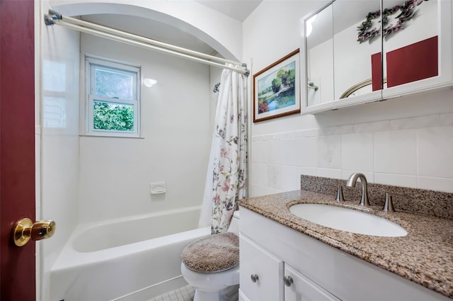 9 Forest Rd, Kings Park, NY 11754 - bathroom featuring shower / bath combo with shower curtain, vanity, toilet, and tile walls