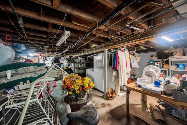 9 Forest Rd, Kings Park, NY 11754 - unfinished below grade area with freestanding refrigerator