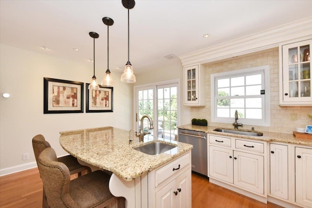1515 Lowell Ave, New Hyde Park, NY 11040 - kitchen featuring a sink, dishwasher, backsplash, and recessed lighting