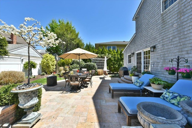 1515 Lowell Ave, New Hyde Park, NY 11040 - view of patio featuring outdoor dining area, fence, and outdoor lounge area