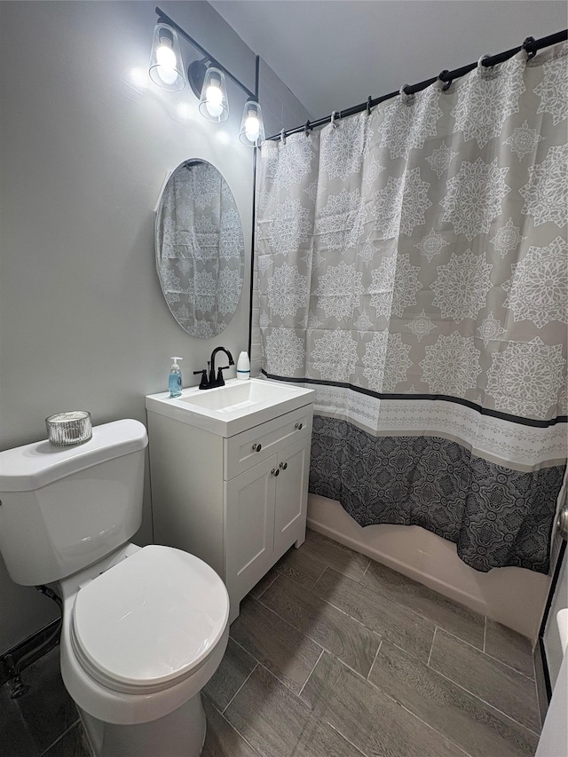2107 Wallace Ave Unit 6E, Bronx, NY 10462 - bathroom featuring toilet, shower / bathtub combination with curtain, and vanity