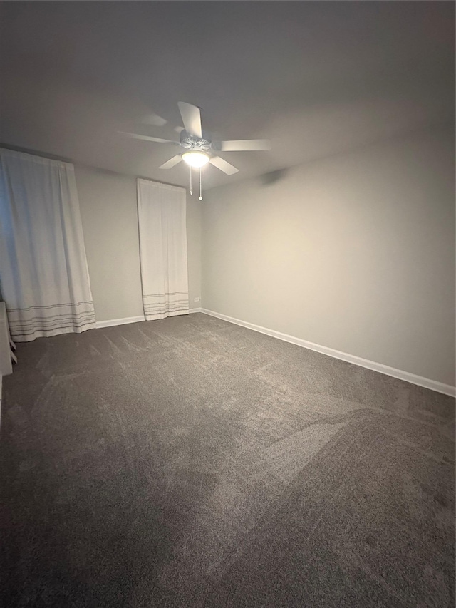 2107 Wallace Ave Unit 6E, Bronx, NY 10462 - unfurnished room featuring ceiling fan, dark colored carpet, and baseboards