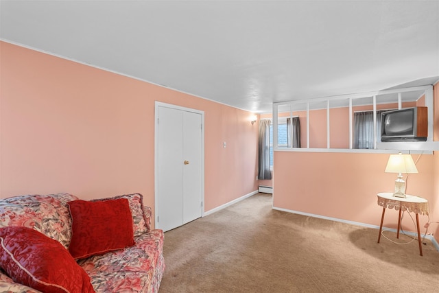 332 E 240th St, Bronx, NY 10470 - carpeted living room featuring baseboards and baseboard heating