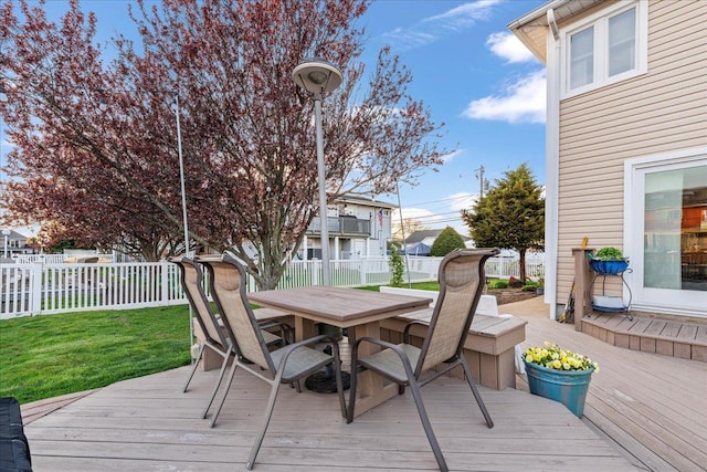 deck featuring outdoor dining area