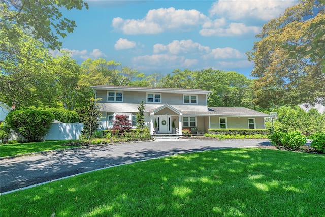 21 Grayon Dr, Dix Hills, NY 11746 - view of front facade with covered porch and driveway