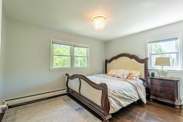 21 Grayon Dr, Dix Hills, NY 11746 - bedroom with a baseboard radiator and wood finished floors
