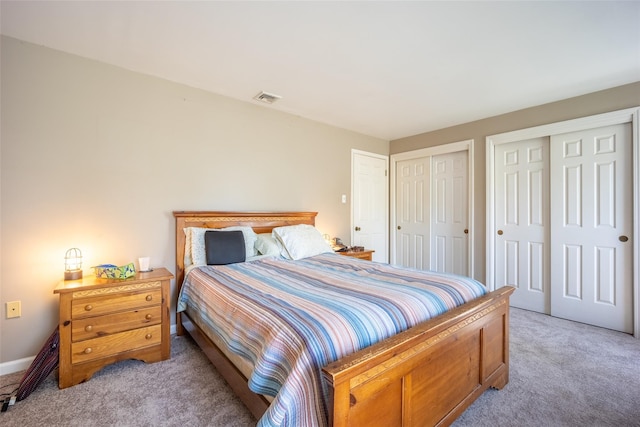 12 Prospect St, Glenham, NY 12508 - bedroom with light carpet, multiple closets, and baseboards