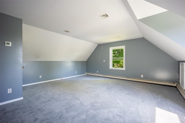 12 Prospect St, Glenham, NY 12508 - bonus room featuring a baseboard radiator, vaulted ceiling, carpet, and baseboards