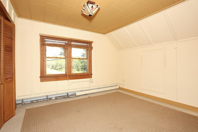 1143 State Route 17b, Mongaup Valley, NY 12762 - bonus room featuring a baseboard radiator, carpet floors, a decorative wall, and vaulted ceiling