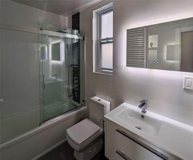58-09 61st St, Maspeth, NY 11379 - full bath with bath / shower combo with glass door, vanity, and tile walls