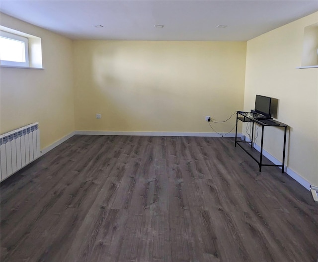 58-09 61st St, Maspeth, NY 11379 - below grade area with radiator and dark wood finished floors