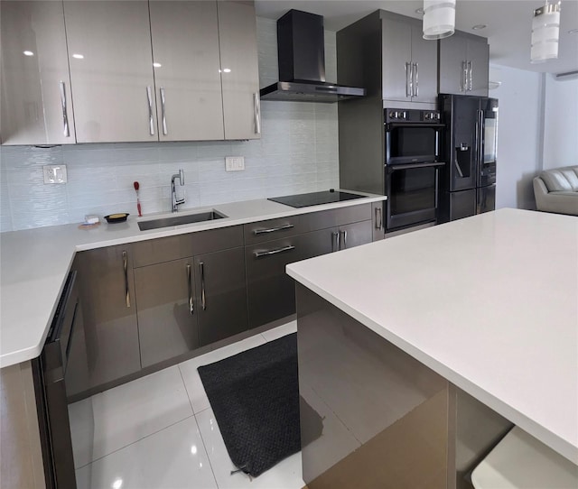 58-09 61st St, Maspeth, NY 11379 - kitchen featuring wall chimney range hood, black appliances, light countertops, backsplash, and modern cabinets