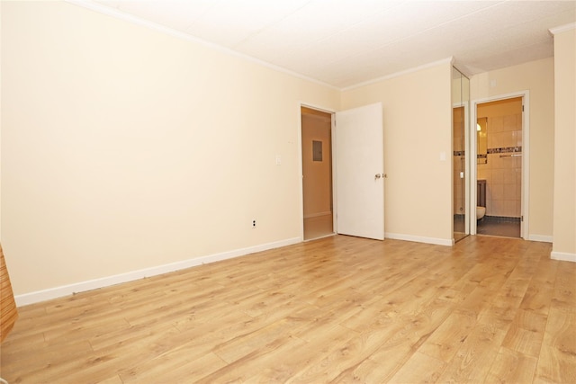 14428 Barclay Ave Unit 2C, Flushing, NY 11355 - unfurnished bedroom with ornamental molding, light wood-style floors, and baseboards