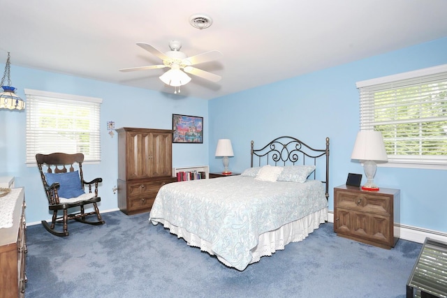 4 Stockbridge Ave, Suffern, NY 10901 - carpeted bedroom featuring multiple windows, baseboard heating, baseboards, and a ceiling fan