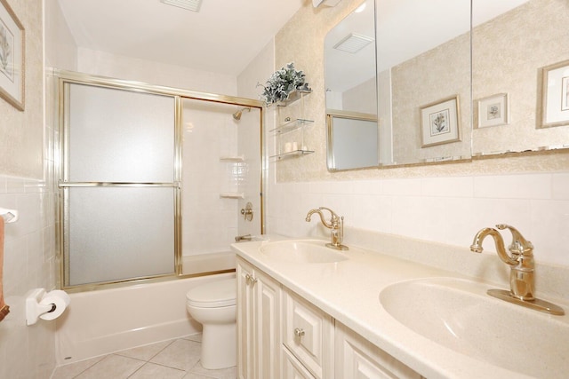4 Stockbridge Ave, Suffern, NY 10901 - bathroom with tile walls, toilet, shower / bath combination with glass door, tile patterned floors, and double vanity