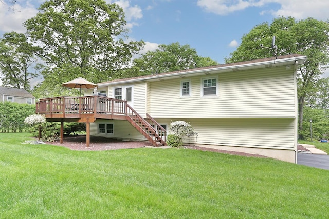 4 Stockbridge Ave, Suffern, NY 10901 - rear view of property featuring a deck, a yard, and stairway