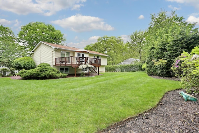 4 Stockbridge Ave, Suffern, NY 10901 - view of green lawn with a deck