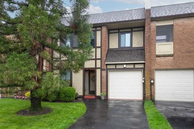 141 Southgate Dr, Massapequa Park, NY 11762 - townhome / multi-family property with a shingled roof, driveway, and a garage