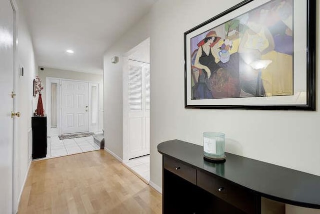 141 Southgate Dr, Massapequa Park, NY 11762 - hallway featuring recessed lighting, baseboards, and light wood-style floors