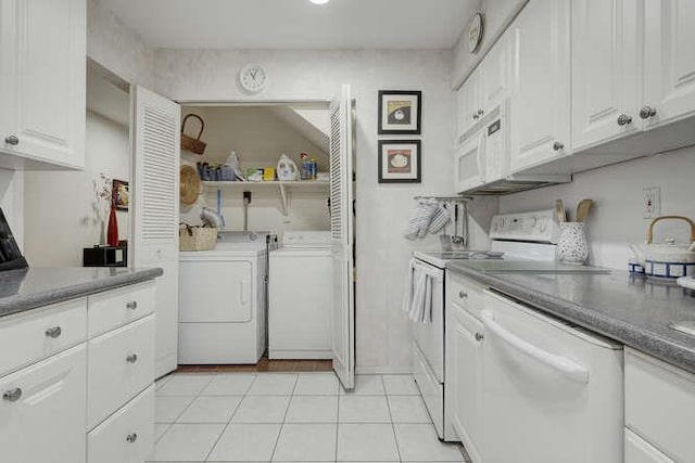 141 Southgate Dr, Massapequa Park, NY 11762 - clothes washing area featuring washer and clothes dryer and light tile patterned flooring