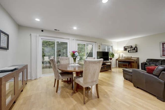 141 Southgate Dr, Massapequa Park, NY 11762 - dining area with light wood-type flooring and recessed lighting
