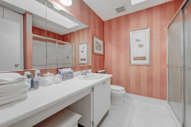 141 Southgate Dr, Massapequa Park, NY 11762 - bathroom featuring a stall shower, vanity, and toilet