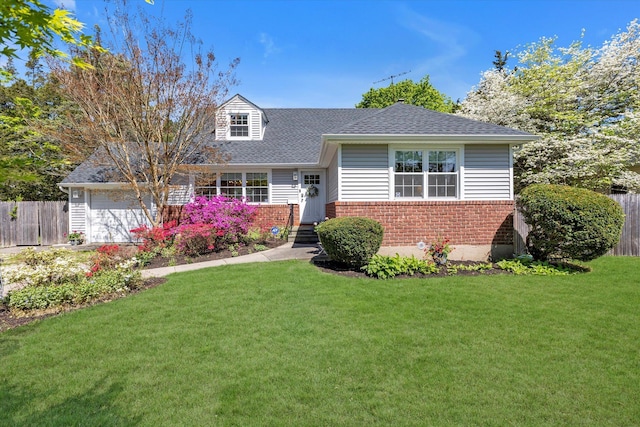 view of front of home featuring brick siding, a garage, roof with shingles, and entry steps
