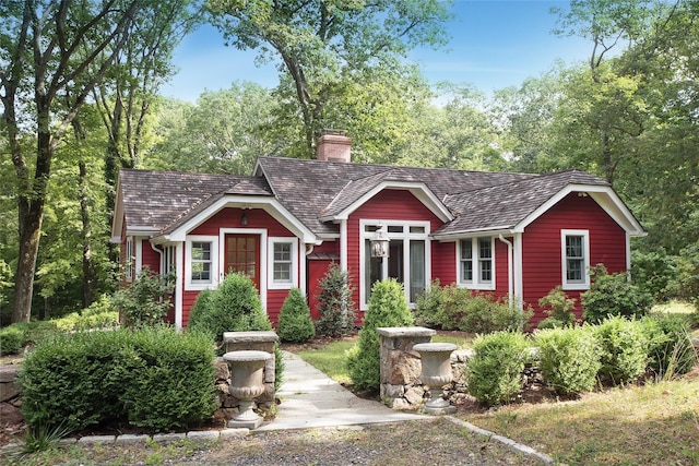 view of front of property with a chimney