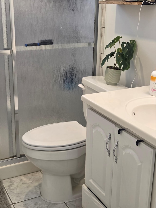 810 Blooming Grove Tpke Unit 84, New Windsor, NY 12553 - bathroom with a stall shower, marble look tiles, toilet, and vanity