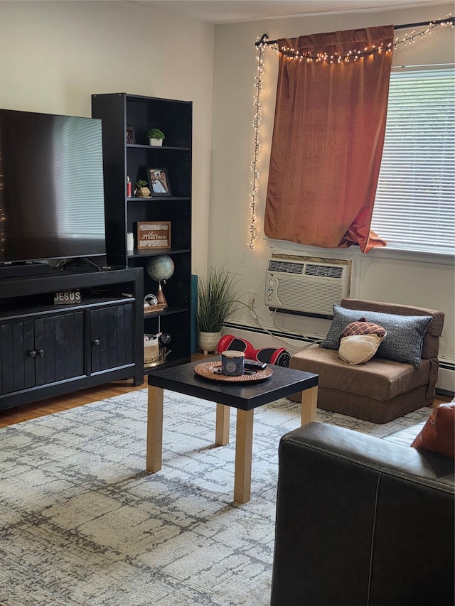 810 Blooming Grove Tpke Unit 84, New Windsor, NY 12553 - living room with wood finished floors and a baseboard radiator