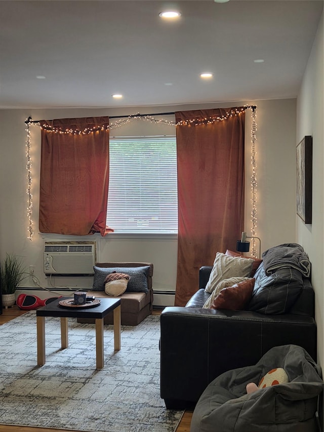 810 Blooming Grove Tpke Unit 84, New Windsor, NY 12553 - living area with a baseboard radiator, wood finished floors, a wall mounted AC, and recessed lighting