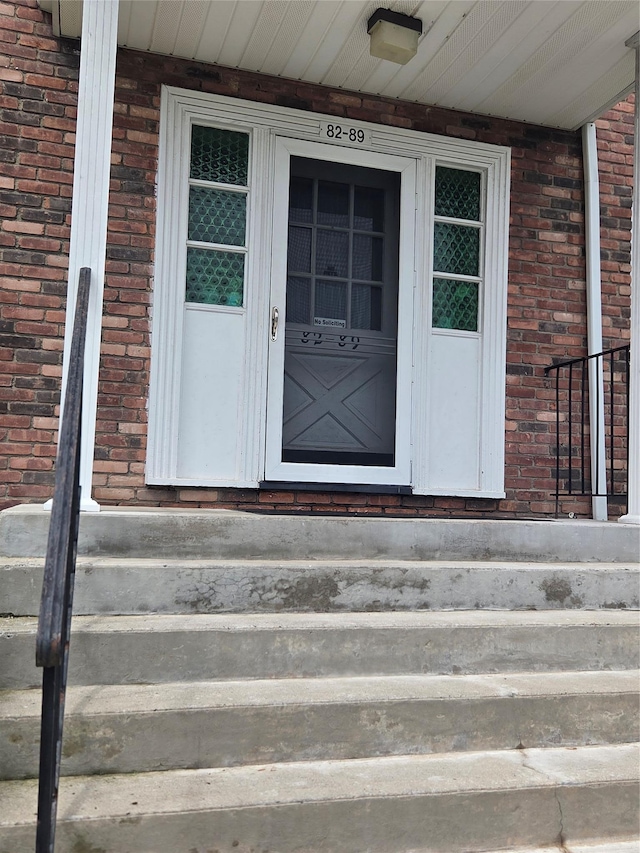 810 Blooming Grove Tpke Unit 84, New Windsor, NY 12553 - doorway to property with brick siding