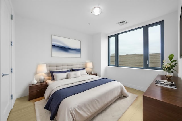 701 Rdg Hill Blvd Unit 12I, Yonkers, NY 10710 - bedroom featuring wood finished floors and baseboards
