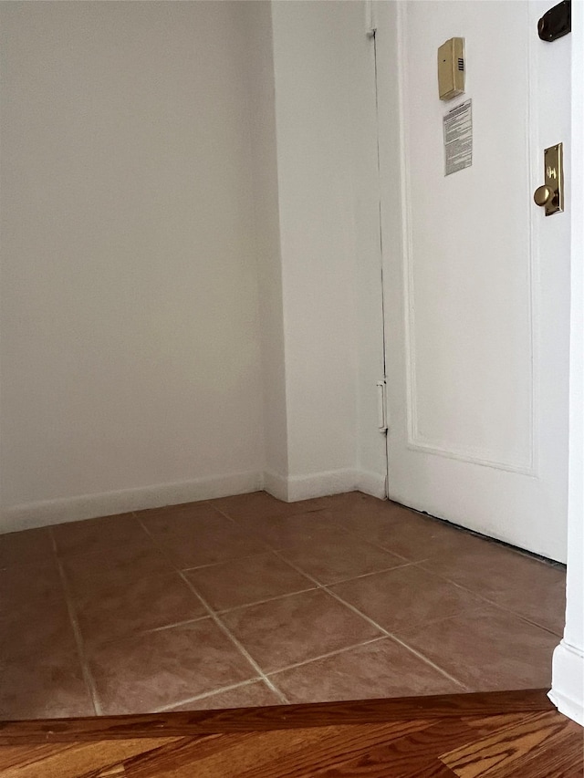 215-44 47th Ave Unit 2B, Bayside, NY 11361 - hall featuring tile patterned floors and baseboards
