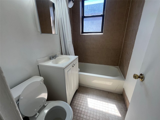 215-44 47th Ave Unit 2B, Bayside, NY 11361 - bathroom with toilet, vanity, tile patterned floors, and shower / bath combo with shower curtain