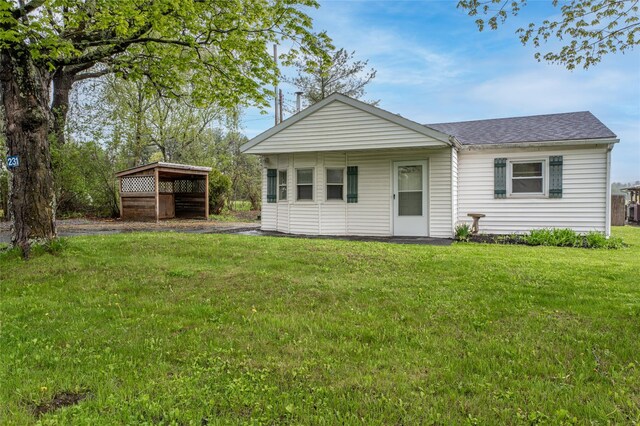 231 Stone Bridge Road Ext, Durham, NY 12423 - rear view of house with a yard and a shingled roof