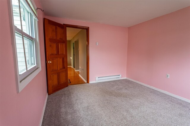 231 Stone Bridge Road Ext, Durham, NY 12423 - empty room featuring a baseboard radiator, carpet flooring, plenty of natural light, and baseboards