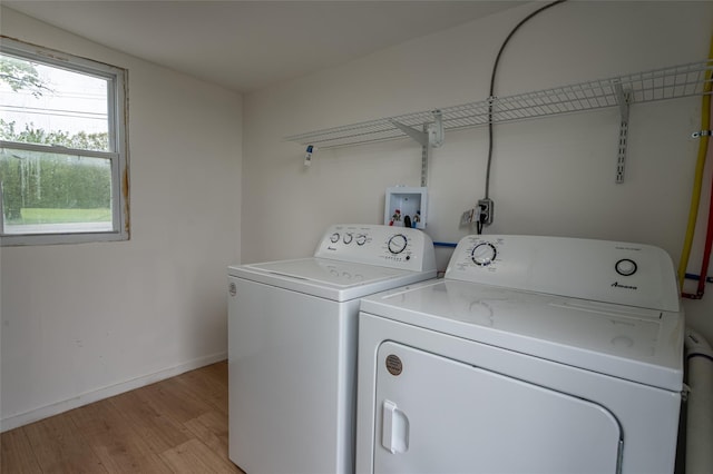231 Stone Bridge Road Ext, Durham, NY 12423 - clothes washing area with washing machine and clothes dryer, light wood-style floors, and baseboards