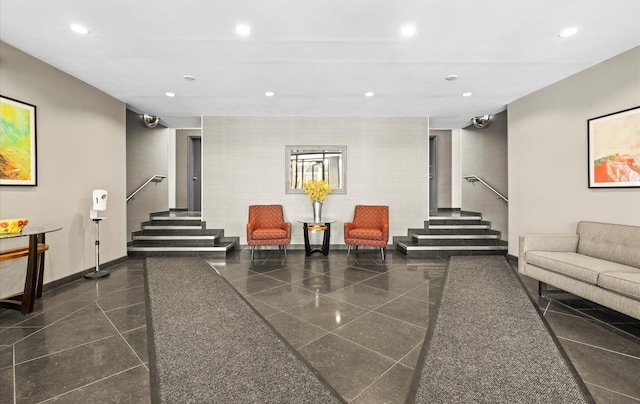 lobby with stairs and recessed lighting