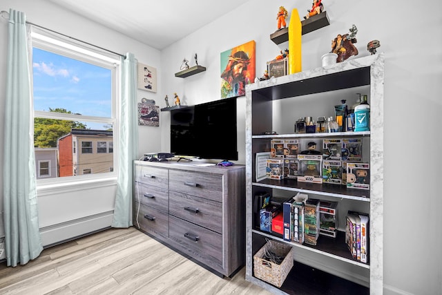 bedroom featuring wood finished floors