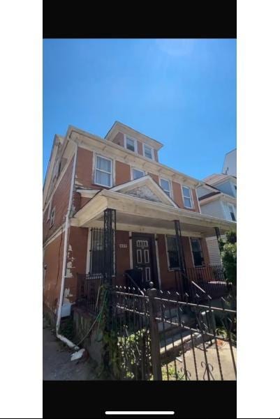 629 E 28th St, Brooklyn, NY 11210 - view of front of home featuring a porch