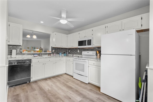 37 Spruce St, Pawling, NY 12564 - kitchen featuring white appliances, a sink, white cabinetry, and recessed lighting