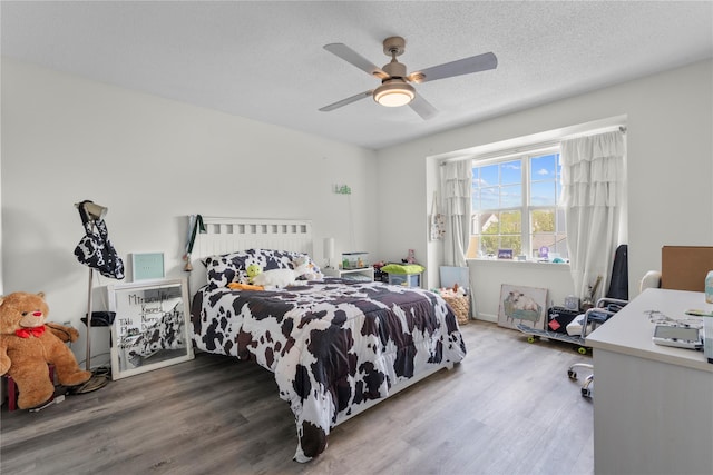 37 Spruce St, Pawling, NY 12564 - bedroom with wood finished floors, a ceiling fan, and a textured ceiling