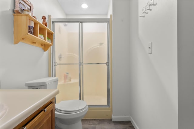 37 Spruce St, Pawling, NY 12564 - full bath with toilet, a shower stall, wood finished floors, recessed lighting, and vanity