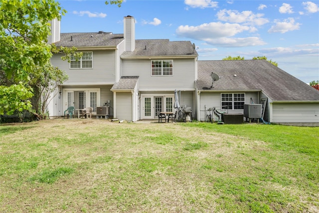 37 Spruce St, Pawling, NY 12564 - back of property with french doors, a yard, a patio, and a chimney